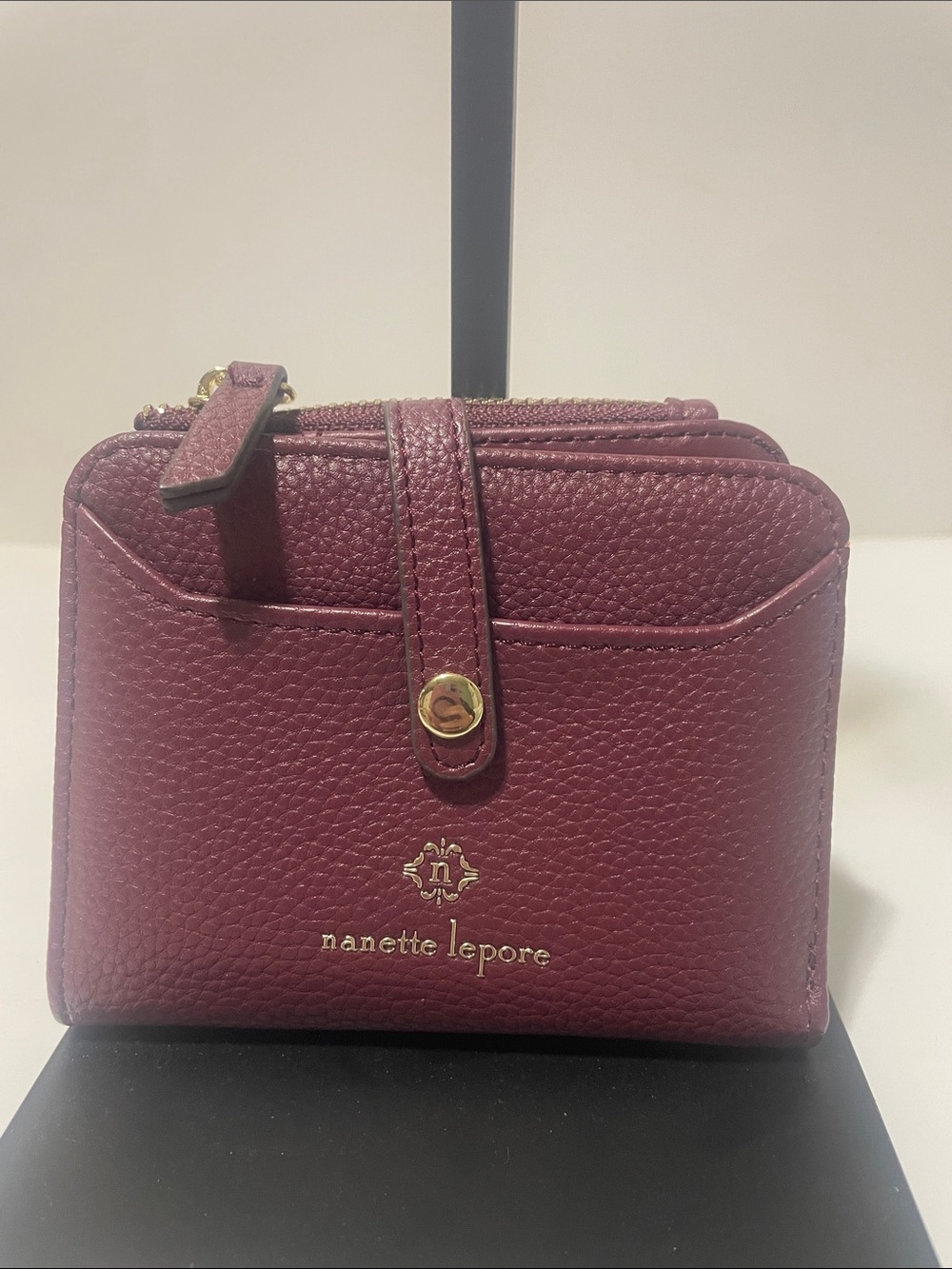 Nanette Lepore Wine Burgundy/Plum Pebbled Leather bifold Wallet with Gold Logo